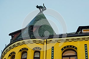 Cat statue on the roof. Detail of Cat House in the center of Riga, Latvia