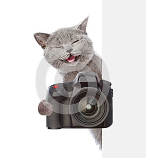 Cat taking a picture behind a placard. isolated on white background