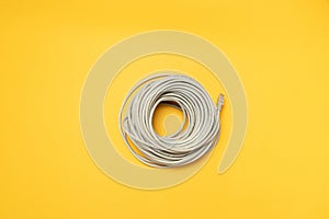 Cat5 Internet Modem Cable on yellow background