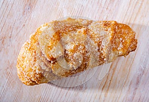 Catalan sweet bun with icing and sugar. photo