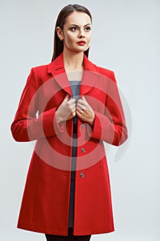 Catalog clothes style photo of young woman isolated on studio b