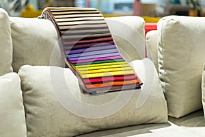 Catalog of multi-colored fabric samples. Textile industry background.