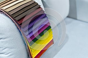 Catalog of multi-colored fabric samples. Textile industry background.