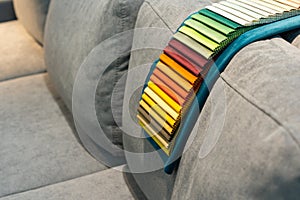 Catalog of multi-colored fabric samples. Textile industry background.