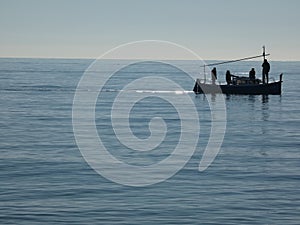 Catalonian boat in the Mediterranean Sea photo