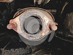 catalyst, vehicle exhaust gas neutralizer. Close-up view. Emission standards for harmful substances. Precious metals photo