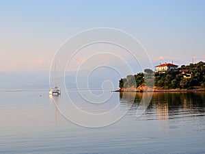 Catamaran Anchored in Calm Gulf of Corinth Bay, Greece