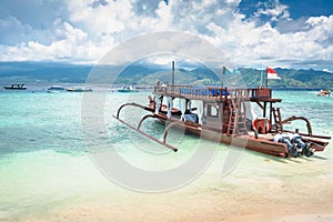 Catamaran as excursion boat at tropical beach