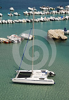 Catamaran with Background Boats