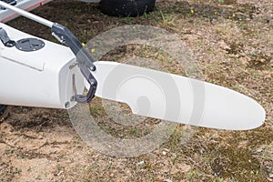 Catamaran boat rudder ashore on sand