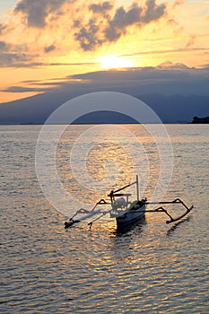 Catamaran boat at the sunrise