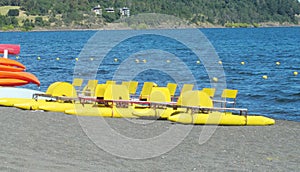 Catamaran boats on a lake shore