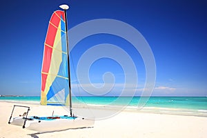 Catamaran sailboat on the beach photo