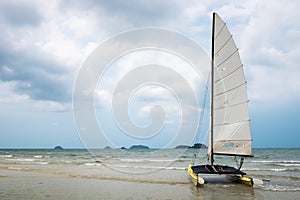 Catamaran sailboat on a tropical beach at Koh Chang island, Thai