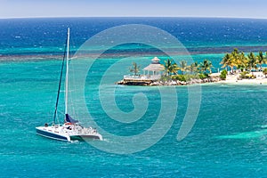 Catamaran Sails on Caribbean photo