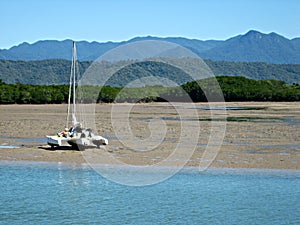 Catamaran on Tidal Mud Flats