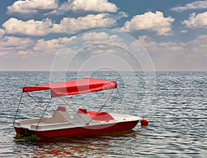 Catamaran for walks on the sea, a boat. Entertainment for tourists, beach holidays. Beautiful picture.