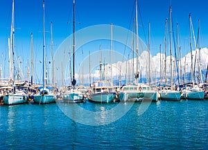 Catamaran yachts and boats in the harbor.