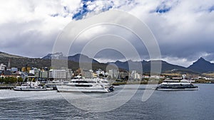 Catamarans and boats in the port of Ushuaia.