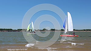 Catamarans go in the regatta by sea 002