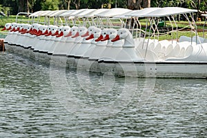 Catamarans in the shape of swans Hall Ratchamongkhon Rama 9 Park Bangkok