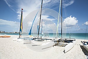 Catamarans on tropical beach. photo