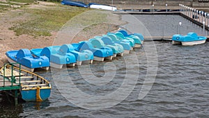 Catamarans on the water in the public Park of the city