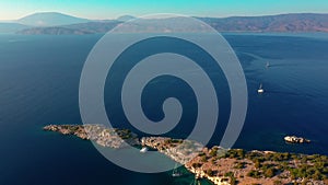 Catamarans and yachts anchored in the bay of the Greek island of Dokos