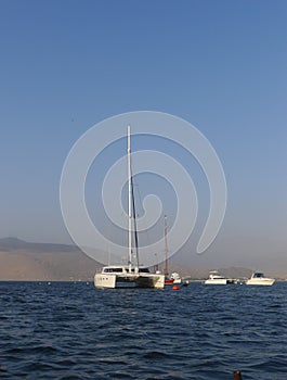 Catamarans and yachts in Ancon beach resort photo