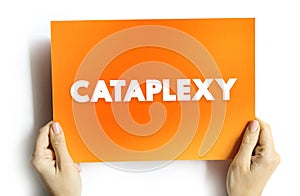 Cataplexy is a sudden muscle weakness that occurs while a person is awake, text concept on card for presentations and reports