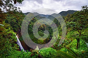 Catarata del Toro waterfall with surrounding mountains in Costa Rica photo