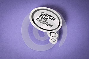 Catch the dream. Speech bubble with text on purple background