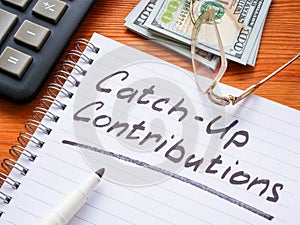 Catch-up contributions memo mark in notepad. photo