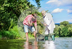 Catching fish with soulmate. Friends catching fish. Fish trapped in net. Oh happy day. Fishing team. Family day. Hobby