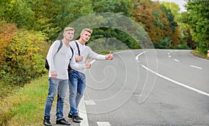 Catching rides. stop car with thumb up gesture. hitchhiking and stopping car with thumbs up gesture at countryside. On