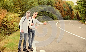 Catching rides. stop car with thumb up gesture. hitchhiking and stopping car with thumbs up gesture at countryside. On