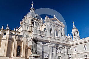 Catedral de la Almudena cathedral and John Paul II statue in Madrid, Spa