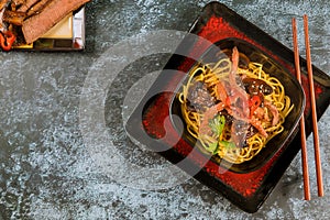 Catelli noodles with vegetables and beef . Asian food