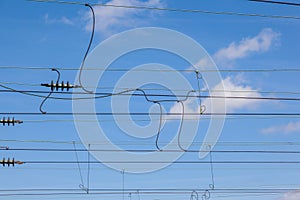 catenary under blue sky for electrified trains