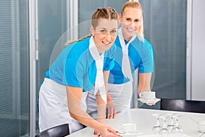 Caterer preparing business lunch