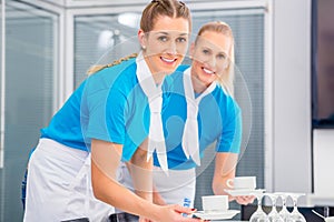 Caterer preparing business lunch