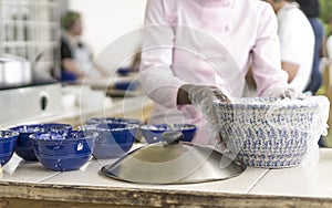 Caterer preparing food on a buffet photo