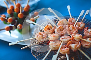 Catering banquet table with different food snacks and appetizers on corporate christmas birthday party event