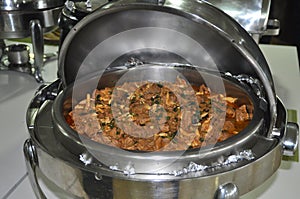 Catering Buffet Food Dish with Meat and Colorful vegetables on a Table