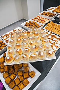 Catering buffet table with a delicious traditional Sicilian meal