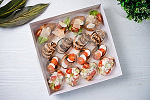 catering cardboard box with bruschetta