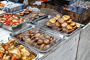 Catering food buffet, salad, grilled mushrooms and potato