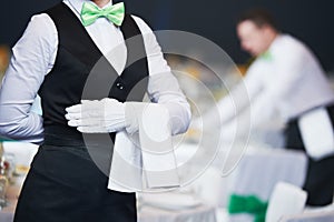 Catering service. waitress on duty in restaurant photo