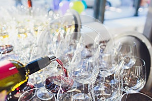 catering services. glasses with wine in row background at restaurant party.