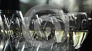 catering services. glasses with wine in row background at restaurant party.